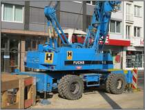 D�sseldorf, U-Bahn-Projekt Wehrhahnlinie, k�nftiger Haltepunkt Kirchplatz, 12.10.2008: Dieser Mobilkran (?) Typ 118 von Fuchs wurde auf mehreren Baustellen der Wehrhahnlinie u.a. f�r die Verlegung von schweren Kanal-Betonteilen eingesetzt. 