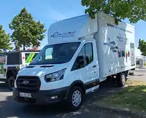 =Ford Transit der Firma MIETTEX, einem Spezialisten für Berufskleidung, abgestellt auf dem Parkplatz der 2025er Rettmobil in Fulda