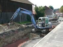 TAKEUCHI-Bagger bei Tiefbauarbeiten in 36088 H�nfeld-Mackenzell am 29.07.2009
