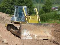 Komatsu-Planierraupe D65EX auf einer Baustelle bei Wallings/Rh�n am 20.09.2009