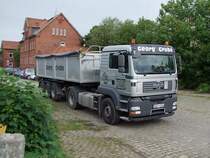 MAN TGA18.400 der Fa. Grube am Weg zur Waggonentladestelle am Bhf. Cuxhaven;090831