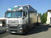 Hngerzug mit Zugmaschine MAN TGA 26 440 der Europa-Transporte
Wagner.Dank an den Fahrer(19.09.2007)