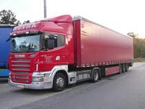 Scania R 420 der Spedition Novak aus Slowenien steht auf einem Rastplatz an der A3, 12.10.2009
