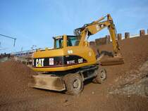 CAT M 315 C bei B�schungsarbeiten an Bahnstrecke Erfurt - Leipzig am 22.10.2009