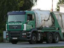 MAN TG460A ist mit einem Transportsilo am Messegelnde in Ried i.I. unterwegs;090820