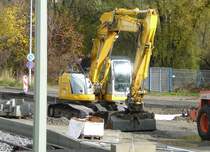 NewHolland E235B auf einer Baustelle in Jena am 04.11.2009
