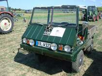  Haflinger 700AP   der Firma Steyr-Daimler-Puch sterreich,
Bj.1965,luftgekhlter Boxermotor im Heck mit 638ccm, 22PS,
das sehr gelndegngige Allradfahrzeug wurde von 1959-74 gebaut und
vor allem von der sterr.-und schweiz.Armee eingesetzt,
fand aber auch in Land-und Forstwirtschaft Verwendung,
Traktorentreff Breisach Sept.2009