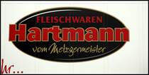 FLEISCHWAREN HARTMANN vom Metzgermeister. Aufgenommen auf einem ThermoKing Auflieger von Schmitz.