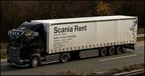 SCANIA RENT: SCANIA HIGHLINE R480 von TSL ist mit einem Planenauflieger von SCANIA RENT Truck&Trailer bei Ldenscheid unterwges. (19.11.2009)