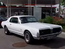 Mercury Cougar(eine Marke der Ford Motor Company),Bj1967 steht vor einer Gro�tankstelle in Ried i.I.;090627