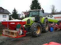 Claas Ares 836 RZ steht in der Landmaschinenausstellung der Gebrder Herrlich in Hofbieber-Langenbieber anl. des 50-jhrigen Firmenjubilums am 20.03.2010