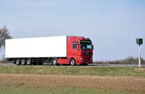 MAN TGA 18.440,  S. Vo Transporte , kurz vor`m  Starenkasten (Blitzer)  auf einer Kreisstrasse von Euskirchen nach Heimerzheim - 17.03.2010