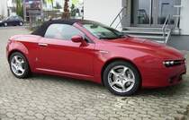 Der gleiche Alfa Romeo Spider von der rechten Seite, gleiches Datum, gleicher Ort; das ist eine  bella macchina !