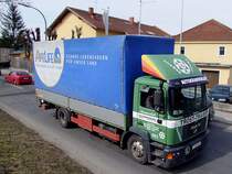 MAN 4.284 tourt durch das Stadtgebiet von Ried i.I.;100319