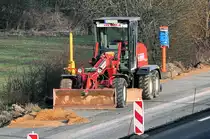 New Holland Grader F 106 6A auf der Baustelle A61 bei Heimerzheim - 18.03.2010