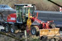 New Holland Grader F 106 6A auf der A61-Baustelle bei Heimerzheim - 18.03.2010