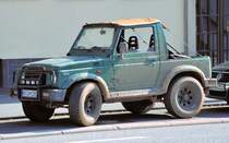 Suzuki Samurai Pickup, stark  eingedreckt , in Bonn 18.03.2010