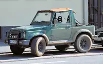 Suzuki Samurai Pickup, stark  eingedreckt , in Bonn 18.03.2010