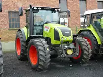 CLAAS Arion 420 steht auf der Ausstellungsfl�che der Raiffeisenwerkstatt in Fulda am 29.03.2010
