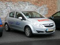 Corsa der Firma HAMA steht auf dem Parkplatz des Media-Marktes in Fulda am 29.03.2010