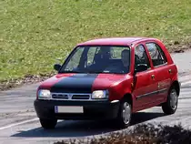 NISSAN_MICRA-Mouse befindet sich nach der Mittagspause wieder am Weg Richtung Arbeitsstelle;100324