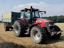 CASE-MXM140 steht mit einem Einachsh�nger f�r die Weizenernte bereit;090809