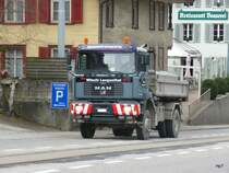 MAN Kipper unterwegs in Aarwangen am 25.03.2010 .. 15:42:41, Belichtungsdauer: 0.008 s (10/1250) (1/125), Blende: f/4.8, ISO: 100, Brennweite: 27.10 (271/10), . 