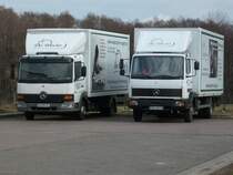 Zwei Mercedes-LKW vom Wschedienst in Bergen/Rgen am 28.Mrz 2010.