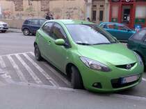 Mazda 2, hellgrn.  Aufgenommen: 07.04.2010
