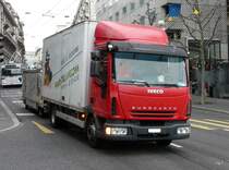 IVRCO mit Kastenaufbau unterwegs in der Stadt Lausanne am 27.03.2010