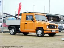 EcoCraft EcoCarrier - Dieses Fahrzeug wird in Kleinserie bei Volkswagen in Sarajevo gebaut. Dabei finden viele Teile wie Achsen, Bremsen, Lenkung aus dem VW-Baukasten Verwendung. Der EcoCarrier verfgt ber Platz fr 2 bis 3 Personen und 2 Euro-Paletten. Elektro-Transporter vllig emissionslos. - fotografiert am 14.04.2010 auf der AMI 2010 in Leipzig - Copyright @ Ralf Christian Kunkel