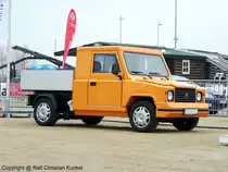 EcoCraft EcoCarrier - Dieses Fahrzeug wird in Kleinserie bei Volkswagen in Sarajevo gebaut. Dabei finden viele Teile wie Achsen, Bremsen, Lenkung aus dem VW-Baukasten Verwendung. Der EcoCarrier verf�gt �ber Platz f�r 2 bis 3 Personen und 2 Euro-Paletten. Elektro-Transporter v�llig emissionslos. - fotografiert am 14.04.2010 auf der AMI 2010 in Leipzig - Copyright @ Ralf Christian Kunkel