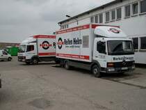 Gleich zwei Mercedes Werkstatt-LKW vor einer Reifenstation am 20.April 2010 in Bergen/Rgen.