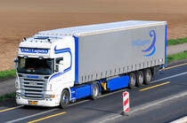 Scania R 500  EMG Logistics  auf der A61 bei Heimerzheim - 04.05.2010