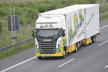 Scania R 420 Sattelzug, auf der A2 bei Lehrte am 09.05.2010.