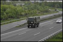 MAN LKW, von der Bundeswehr auf der A2, bei Lehrte am 11.05.2010.