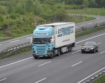 Scania Sattelzug, auf der A2 bei Lehrte/Niedersachen, am 11.05.2010.