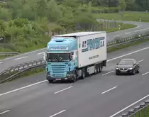 Scania Sattelzug, auf der A2 bei Lehrte/Niedersachen, am 11.05.2010.