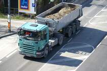 Scania R400  Koller  fahrt beladen mit einer Schmitz-Mulde am Handelskai. 7.4.2010