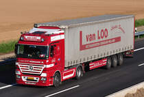 MB Actros 1848  L. von Loo  auf der A61 bei Heimerzheim - 04.06.2010