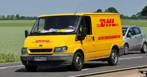 Ford Transit der DHL unterwegs in Euskirchen-Fla 24.06.2010