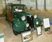 Ford V8 Pilot Shooting Brake von 1951.

Dieser Wagen ist bekannt als der  Woody  Shooting brake und war das letze Fahrzeug, das K�nig Georg besa�. Er wurde 1951 bestellt, aber der K�nig verstarb 1952 bevor er den Wagen nutzen konnte. Die K�nigliche Familie benutze den Wagen noch bis in die 1960er Jahre.
