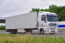 MAN TGA 18.440, gesteuert von einer  Truckerin  (jetzt nicht mehr erkennbar)auf der A61 bei Heimerzheim - 05.07.2010