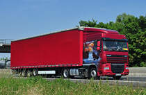 DAF XF 105.460 Pritschenauflieger auf der A61 bei Heimerzheim - 24.06.2010