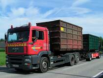 MAN kehrt mit den entleerten Containern zur Betriebssttte zurck;100713