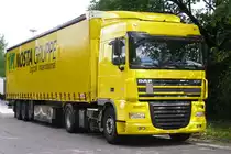 DAF - XF  105.410 mit Planenauflieger der Nosta-Gruppe, gesehen nahe L�denscheid am 15.7.10