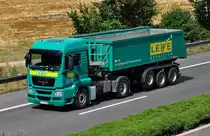 MAN Kippsattel  LEWE Spedition  auf der A61 bei Weilerswist - 15.07.2010