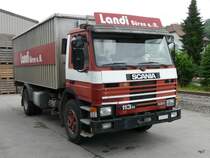 Scania 133 H 320 mit Kastenaufbau in Ben an der Aare am 11.07.2010