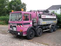 MAN-Entsorgungsfahrzeug am 02.August 2010 auf der Ladestrae von Bergen/Rgen.