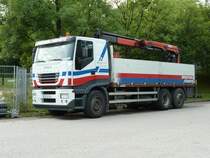 Iveco Stralis mit Ladekran steht in Mnchen, Juli 2010